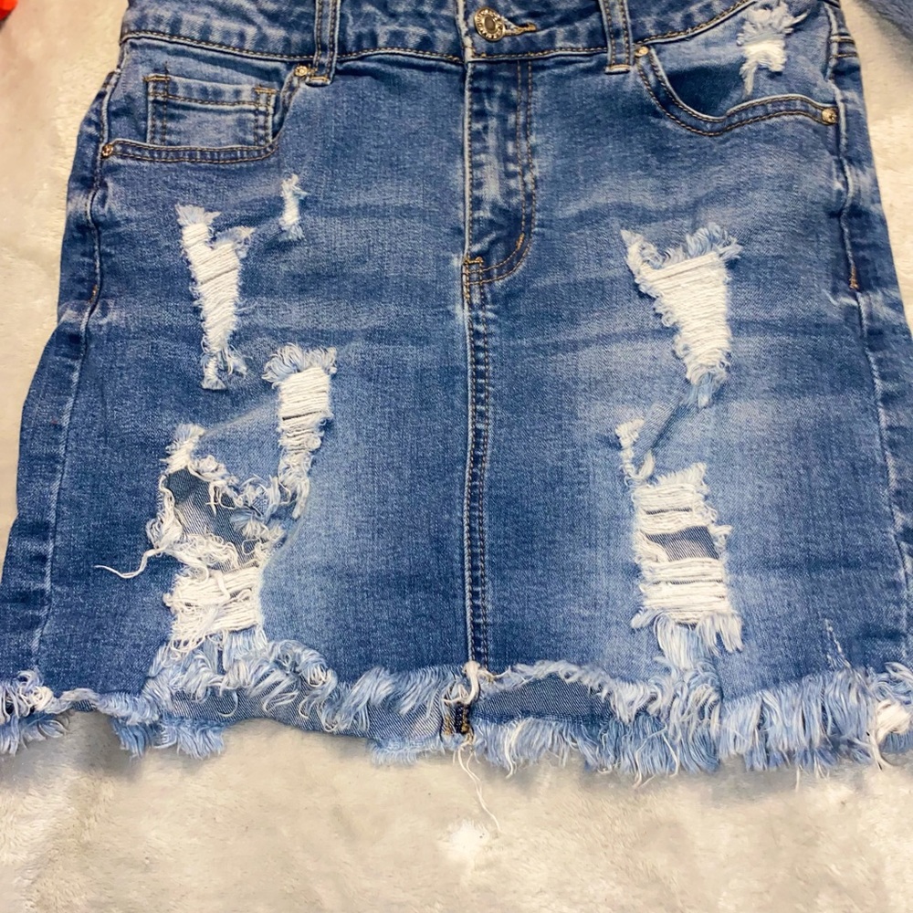 Distressed jean skirt